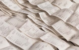 La fin des tickets de caisse papier de nouveau reportée !